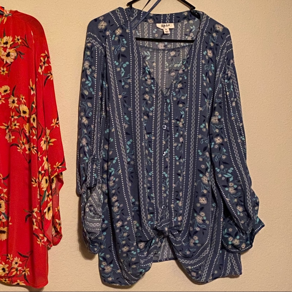 A beautiful blue blouse that ties in the front